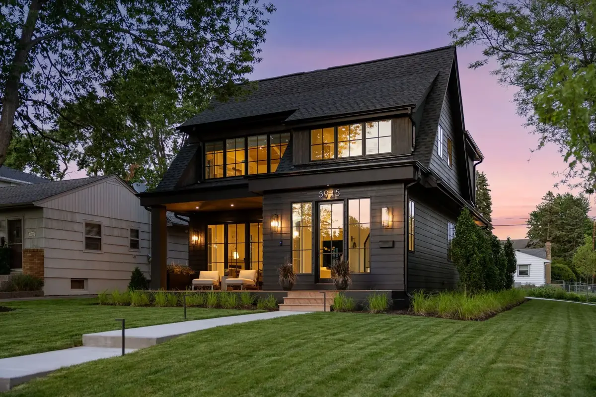 A well-kept home and lawn at dusk in the southwest Twin Cities metro