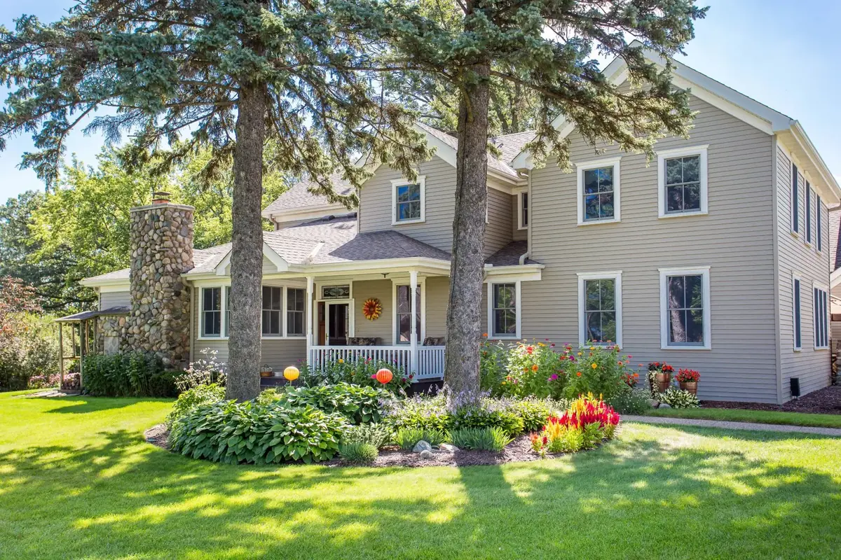 A landscaped home with beds in full color, southwest Twin Cities metro