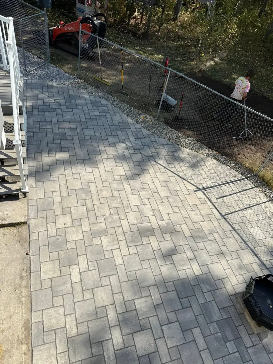 A full paver patio laid by the Heads Up installation crew