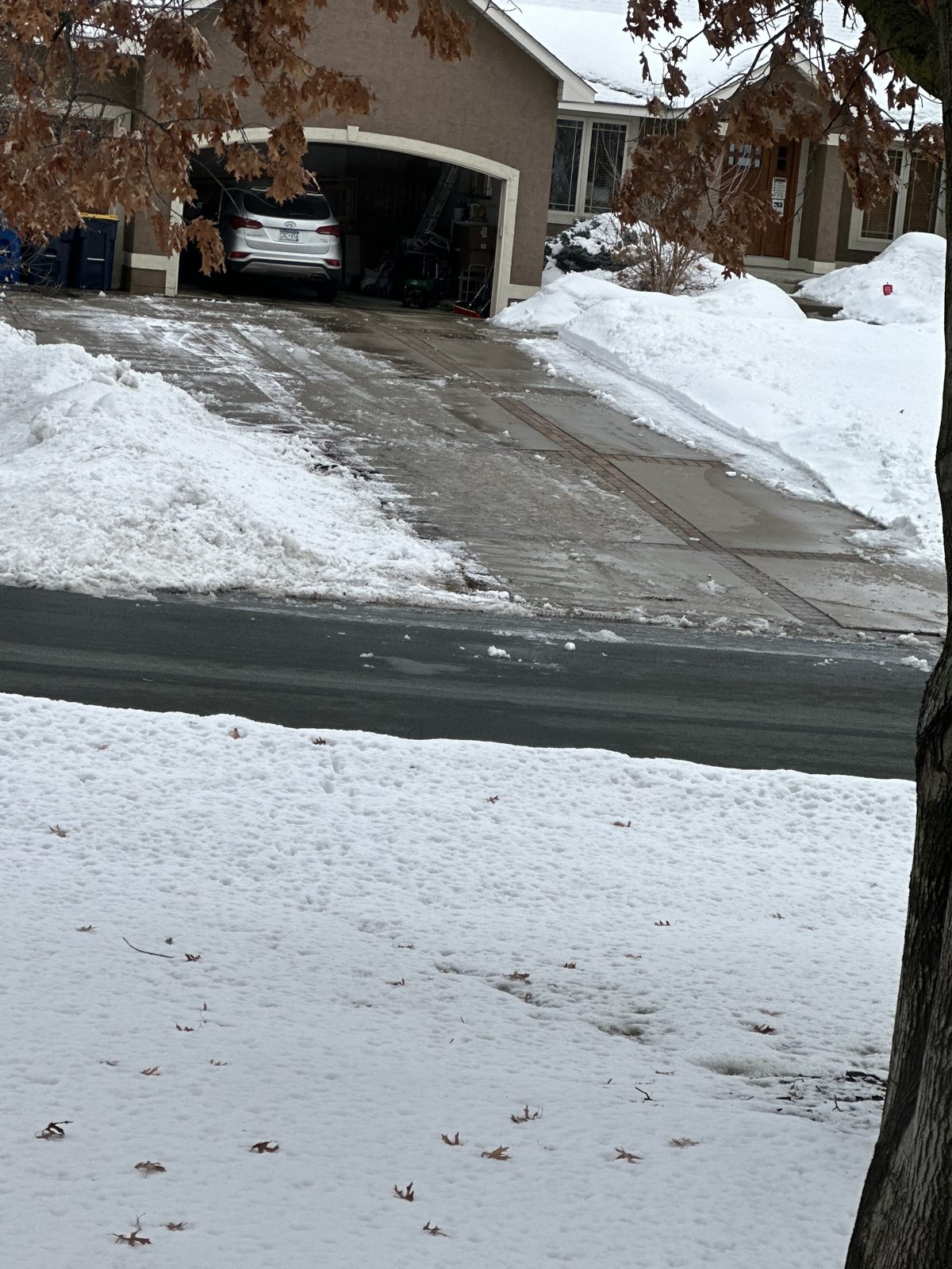 Cleared residential driveway after snowfall in Savage, MN
