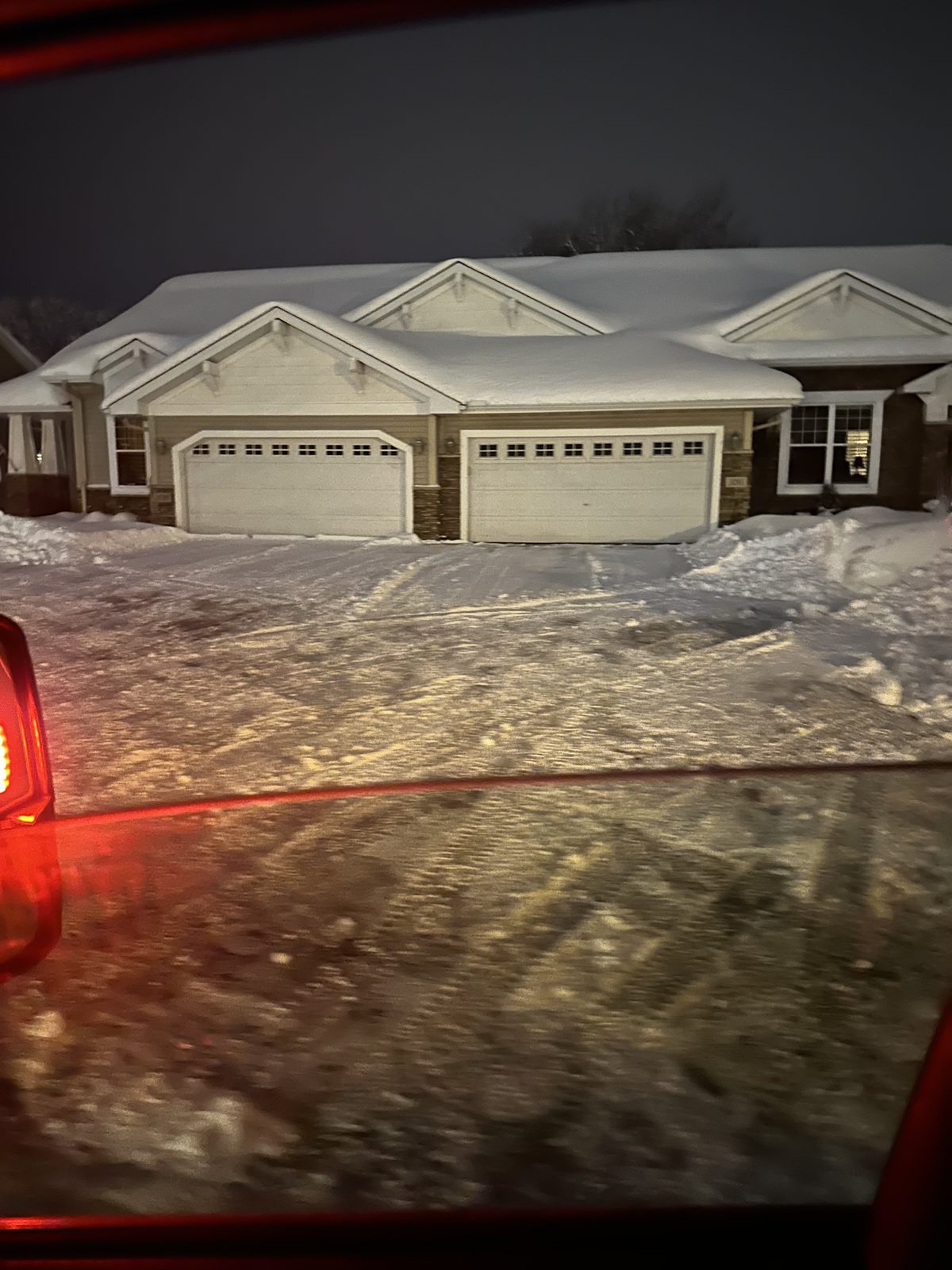 Cleared townhome driveways after night plowing in Eden Prairie, MN