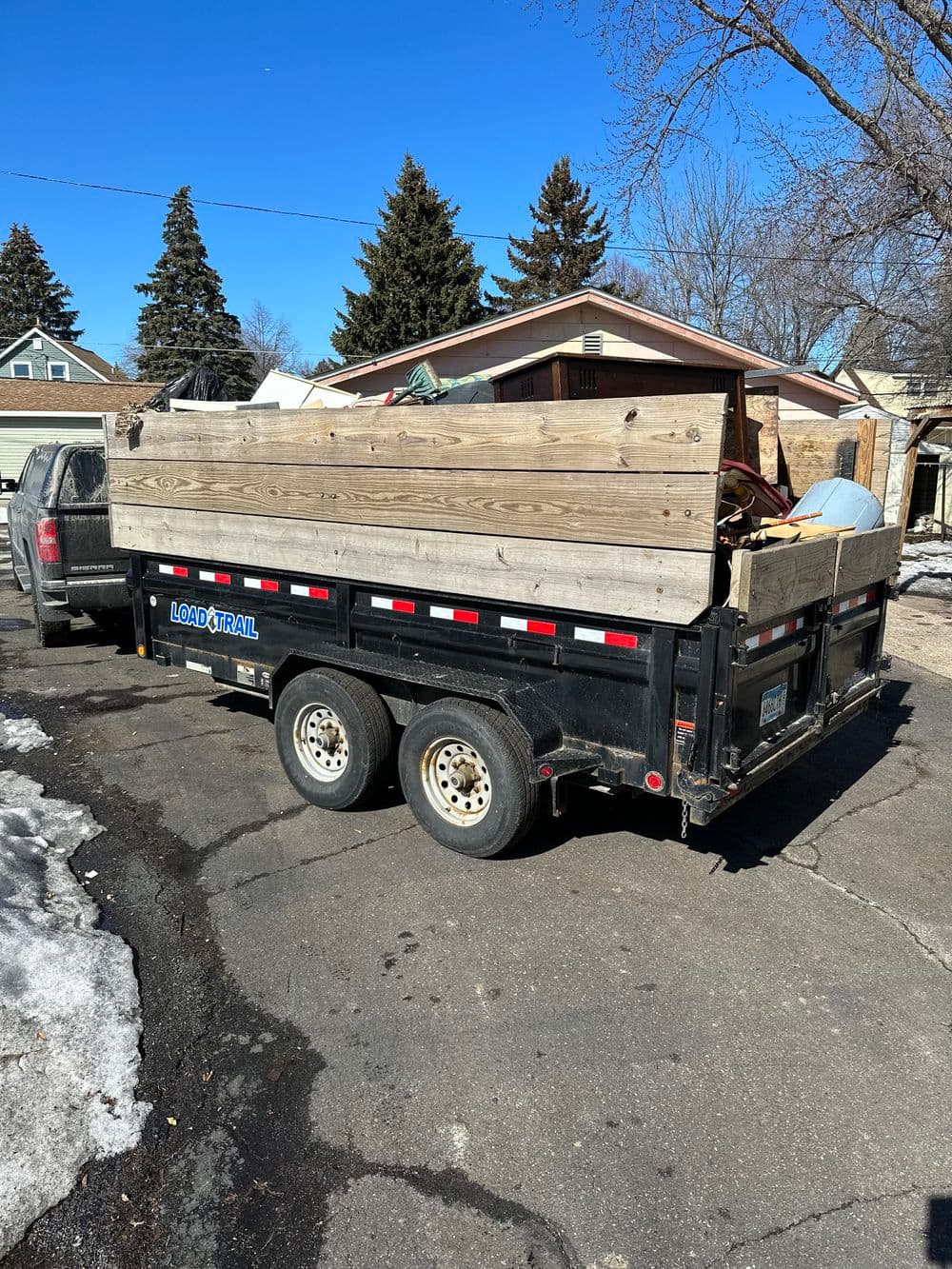 Yard debris loaded and hauled off